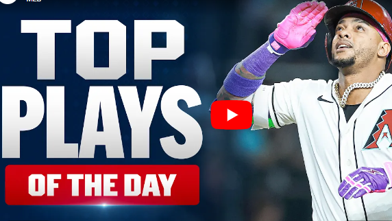 Ketel Marte home runs celebration with purple gloves under stadium lights