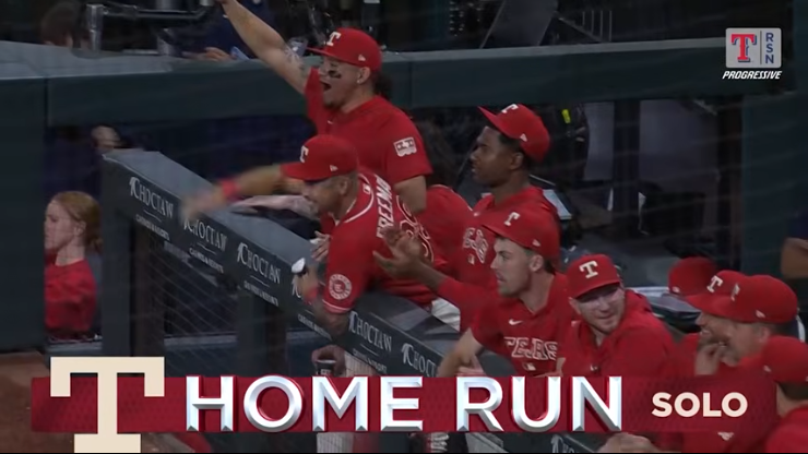 Rangers vs Padres Game Recap: Players celebrating in dugout.