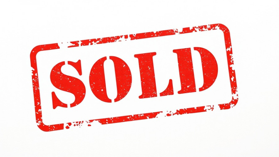 Red 'SOLD' stamp with distressed texture on white background.