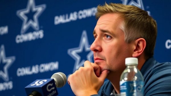 Dallas Cowboys press conference, speaker in team attire discussing.
