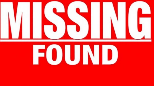 Missing toddler and woman found sign on red background.