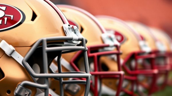 49ers helmets with logo, related to civil rights complaint.