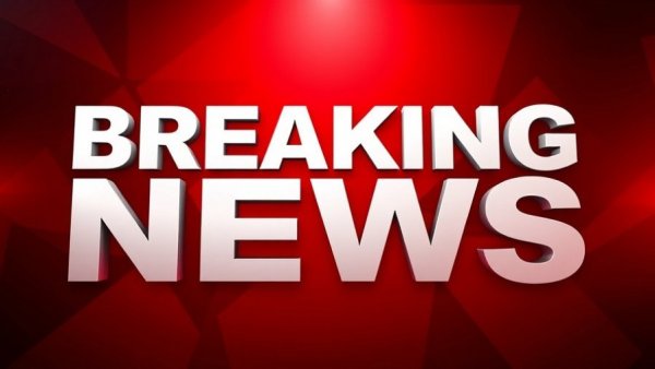 Breaking news alert with dynamic red background.