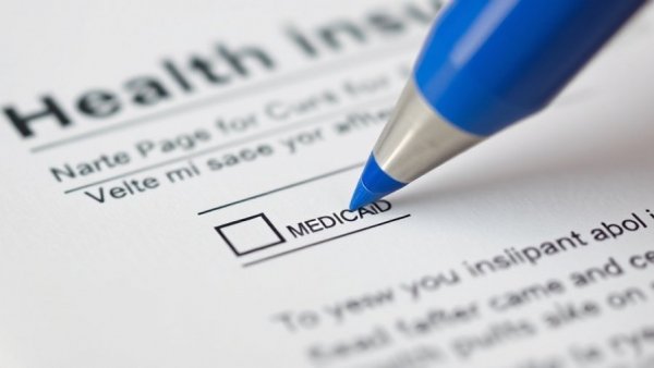 Health insurance claim form with focus on Medicaid section, highlighting ghost providers issue.