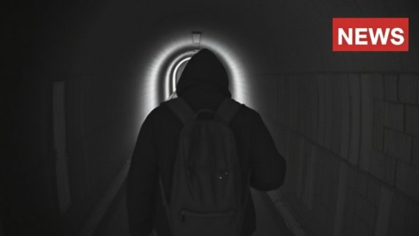 Infrared image of a person entering a tunnel, breaking news, Fox News logo.