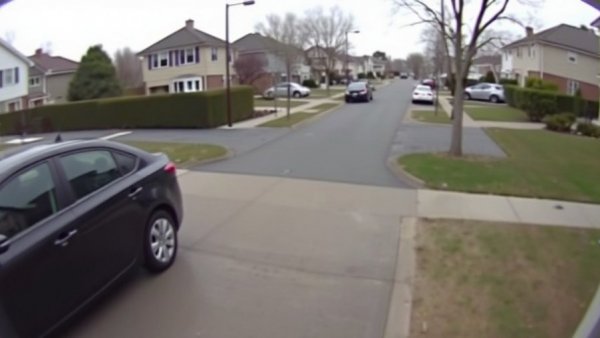 Surveillance footage of a Houston street related to news shooting.