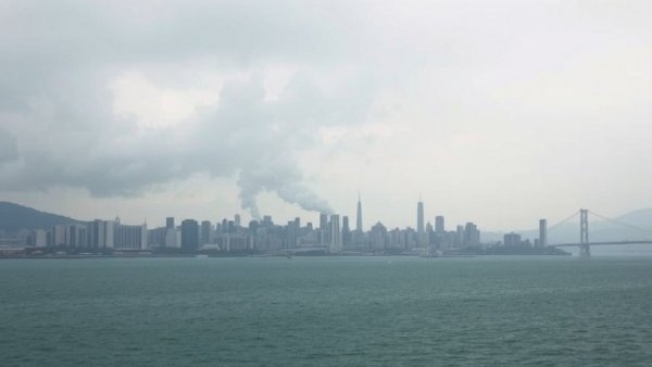 Puerto Vallarta coastline with smoke, highlighting violence news.