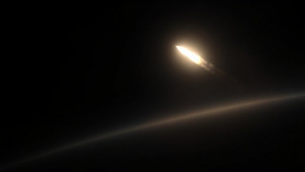 Intercontinental missile test launch with fiery trail against dark sky.