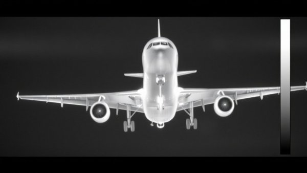 Thermal imaging of aircraft with unclassified markings.