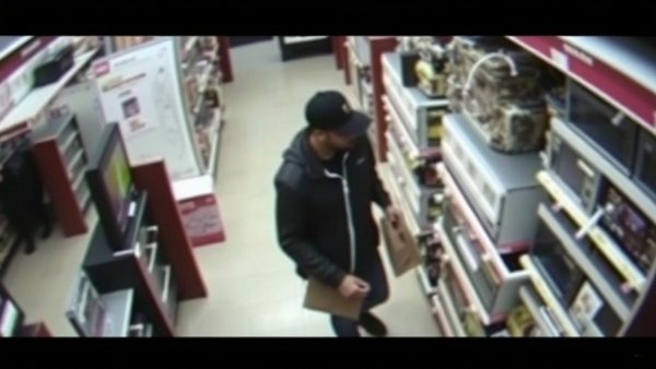 Surveillance photo in Dallas store linked to crime news.