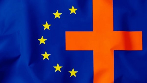 European Union flag marked with an orange cross.