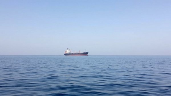 Cargo ship in Gulf of Oman during Iran armed piracy response.
