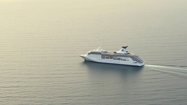 Quiet cruise ship on calm ocean amid hantavirus outbreak news.
