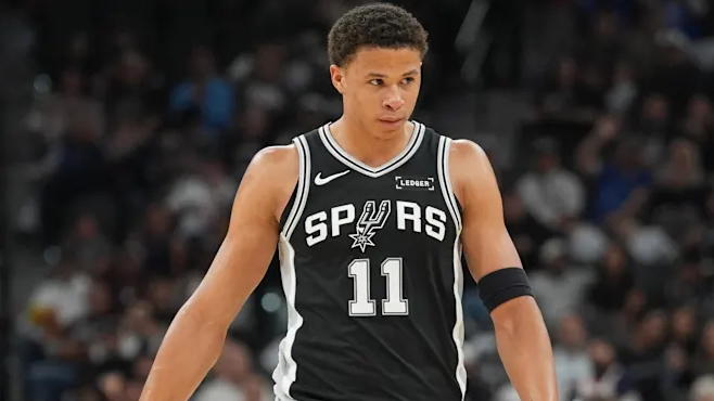 Basketball player discusses season-high performance at press conference in San Antonio sports news.