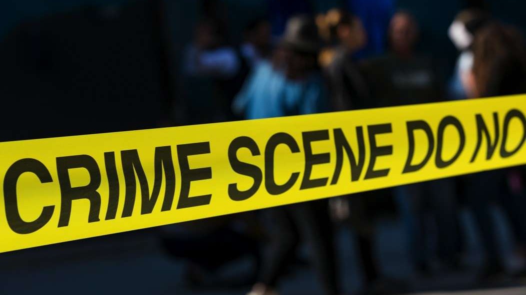 Sunny Fort Worth neighborhood with police scene tape, reflecting community relations after shootings.