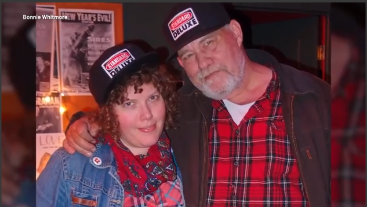 Austin news anchor reporting in modern city studio.