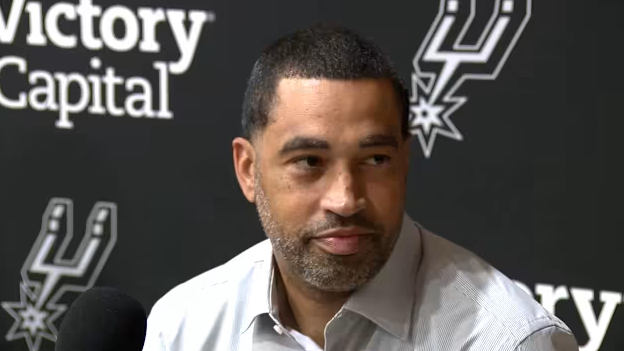 Man discussing the San Antonio Spurs offseason moves in a studio.