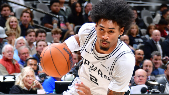 San Antonio sports news featuring basketball highlight.