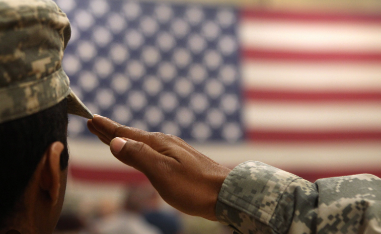 US news articles depicting army soldiers saluting during national ceremonies.