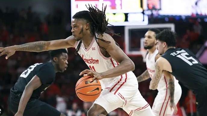 Jojo Tugler evolution on the court during a game action shot.