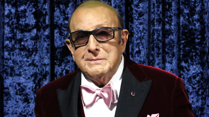 Clive Davis legacy in the music industry: classic group photo with smiles