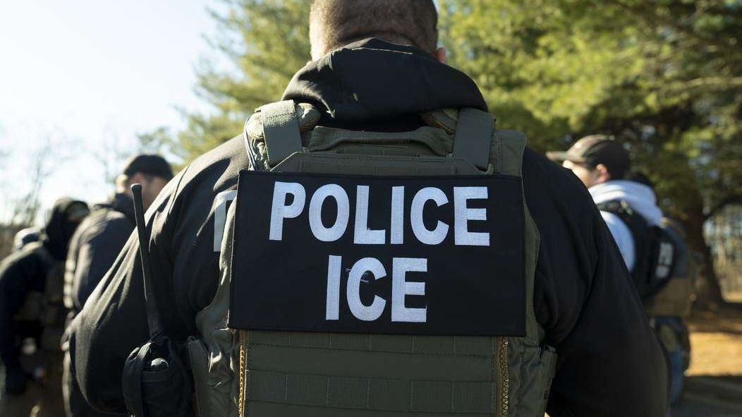ICE officer in tactical gear reflecting Texas immigration policy