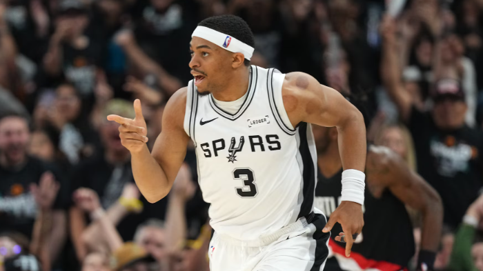 San Antonio Spurs player giving an interview during highlights.