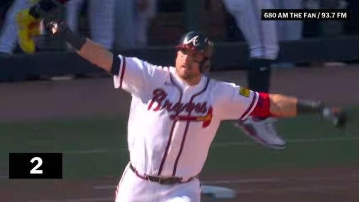 Top MLB Plays of 2026, baseball player swinging bat, action shot.