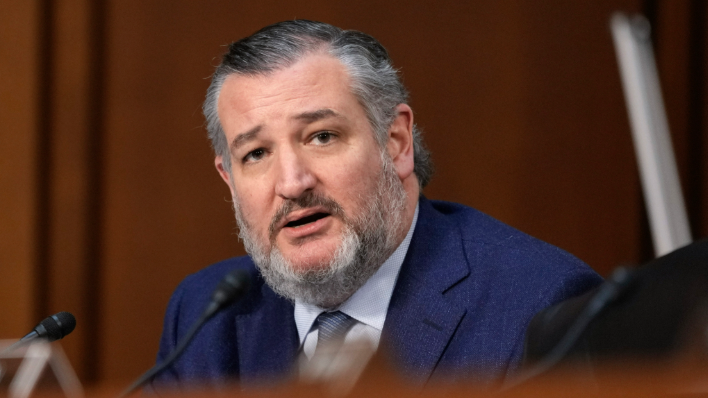 National news headlines: Man speaking at a news event.