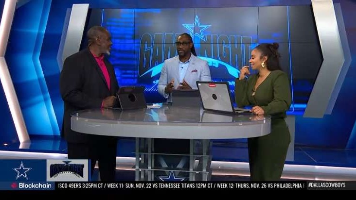 Dallas Cowboys player celebrating touchdown at game night