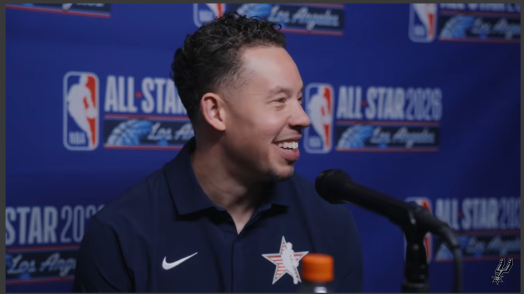 NBA All-Star Game experience with a focused coach at the event.