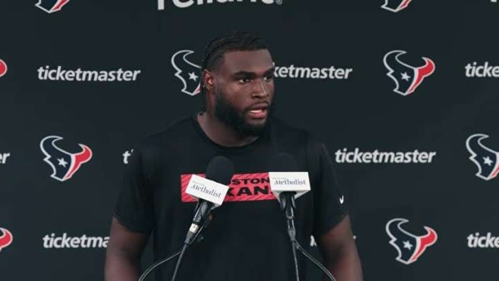 Will Anderson Jr. discussing Joe Burrow and Bengals at a press event.