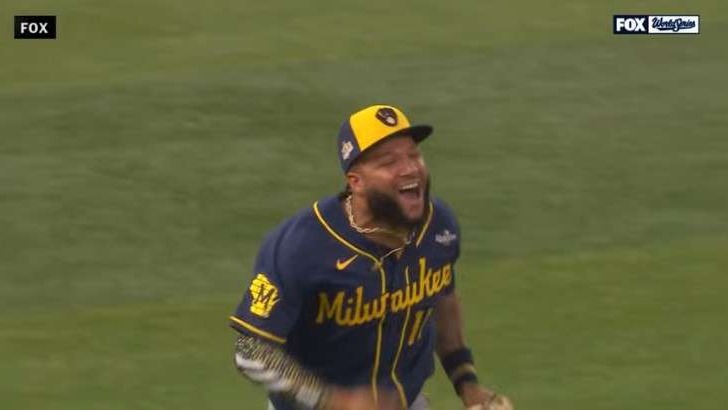 Milwaukee Brewers players celebrate World Series Championship victory on field.