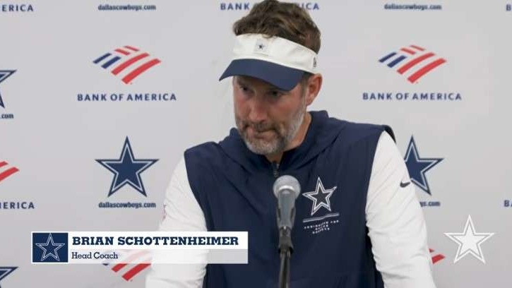 Dallas Cowboys coach smiling at a preseason victory press conference