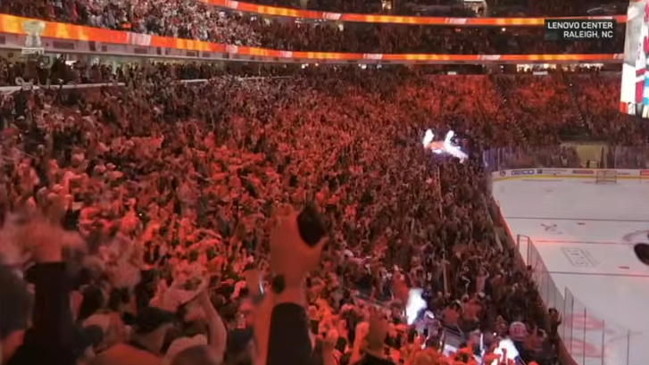 Carolina Hurricanes captain celebrates Stanley Cup win in game 6.