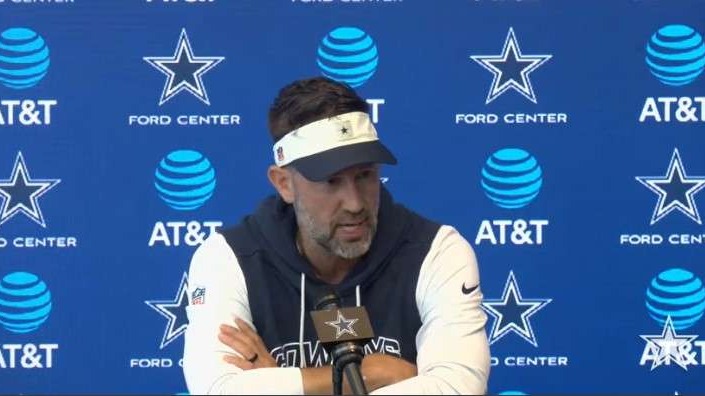 Smiling coach at Dallas Cowboys press conference