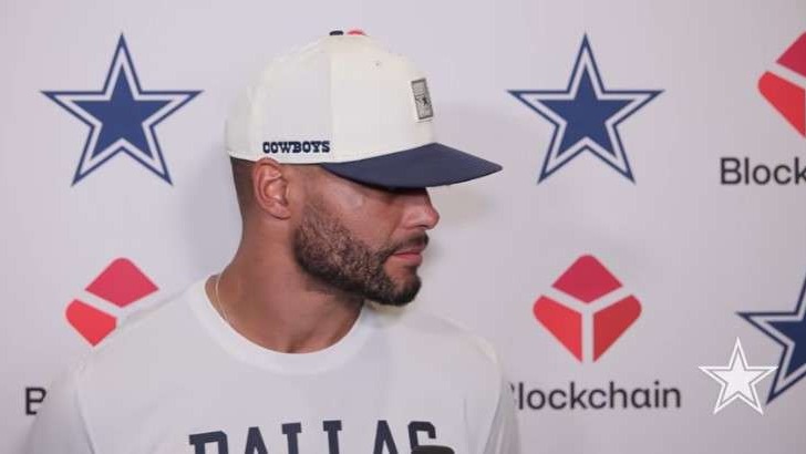 Dak Prescott speaking confidently during a press interview.