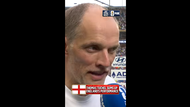 FIFA World Cup leadership depicted by a man speaking on the field.