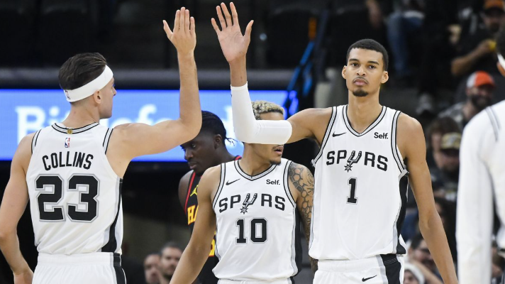 San Antonio Spurs highlights showdown graphic with intense player expressions.
