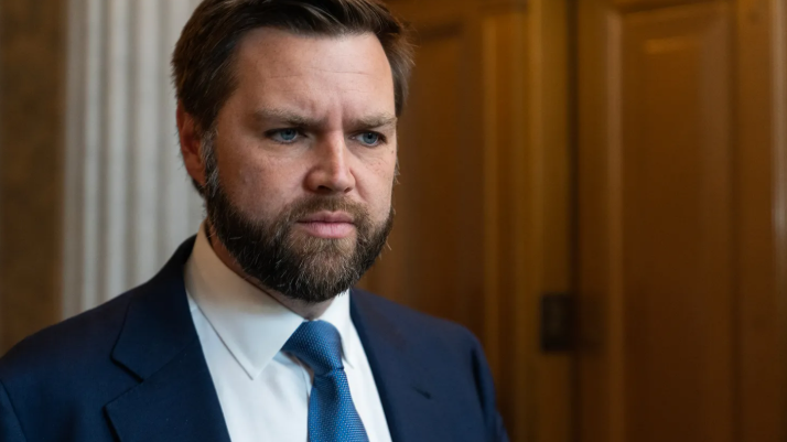 Security personnel discussing on an airport ramp under clear sky.