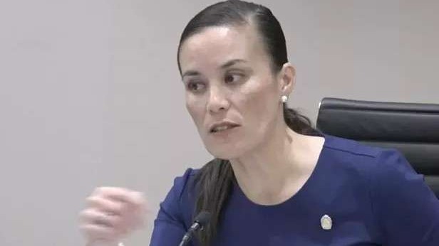 Confident speaker at podium during State of the City address San Antonio.