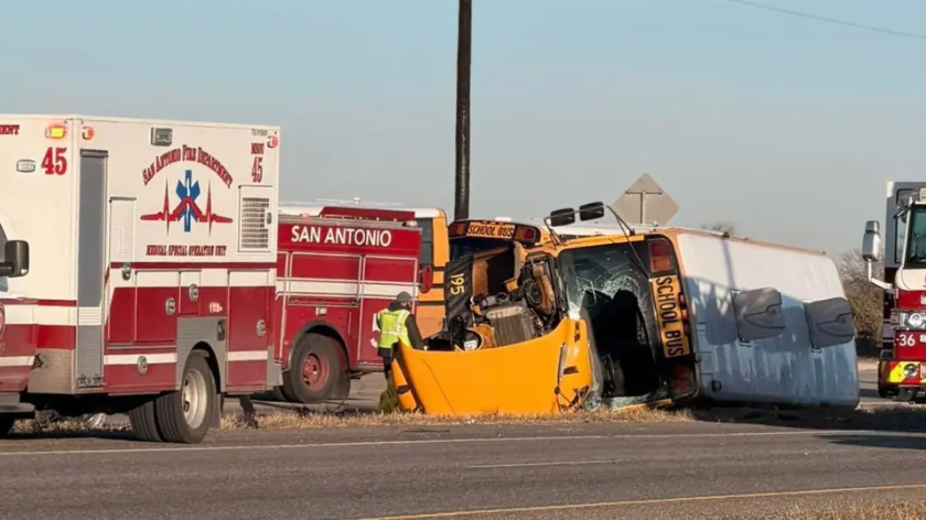 San Antonio school bus crash scene with overturned bus.