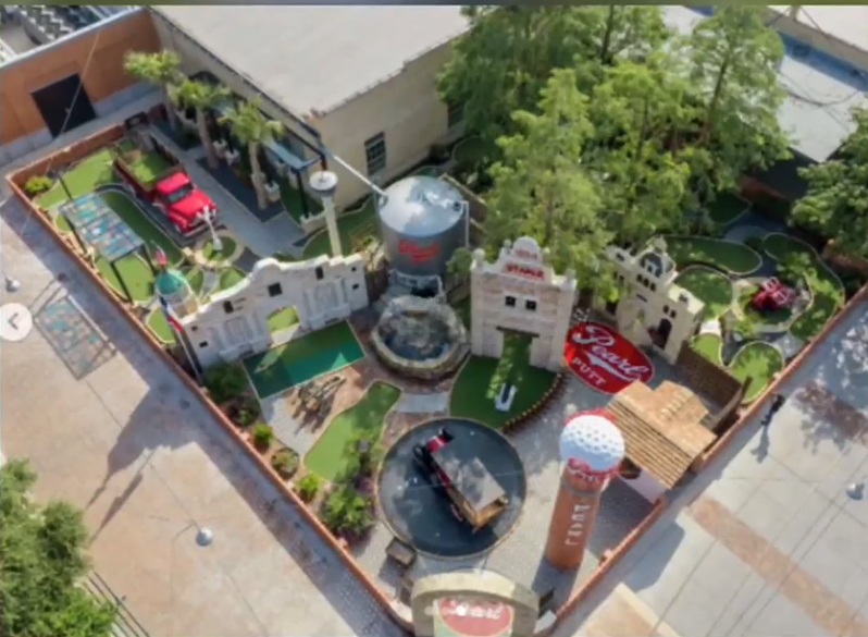 San Antonio mini golf course featuring landmarks amidst historic buildings