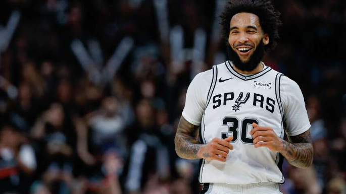 San Antonio Spurs player celebrating during playoffs.