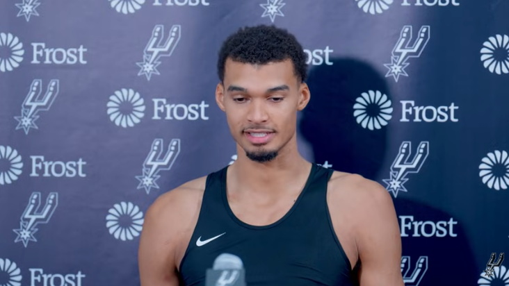 Confident basketball player discussing growth, emphasizing development.