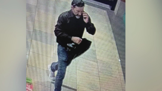 Security footage of two men in San Antonio police theft case.