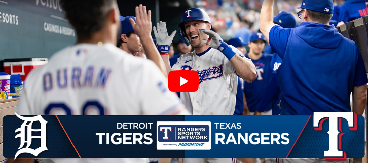 Rangers vs Tigers Game Recap: players celebrating in dugout.