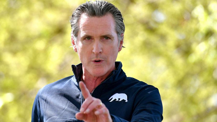 Breaking news about Gavin Newsom speaking at a political event.