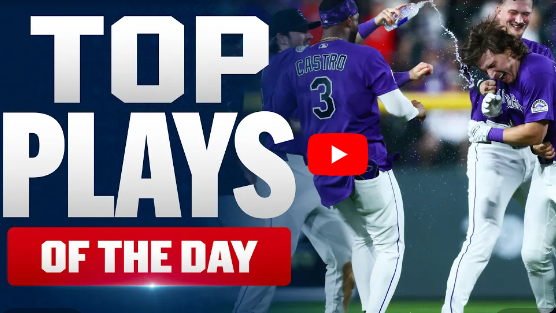 Ohtani's 30th leadoff HR celebration with players in purple uniforms.