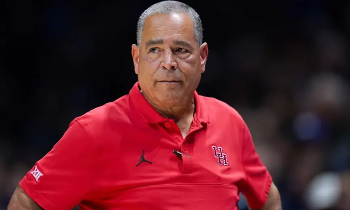 Basketball players in hallway reflecting on game - Kelvin Sampson coaching future.